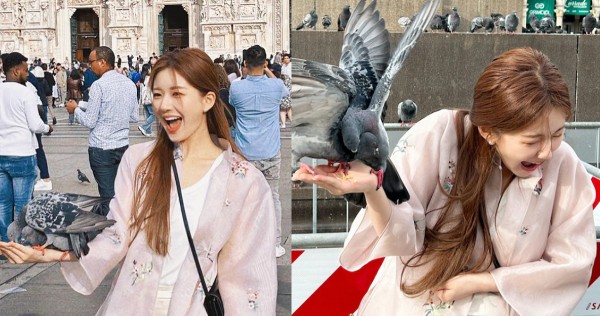 中国女演员赵露西在米兰参加时装周时被鸽子袭击