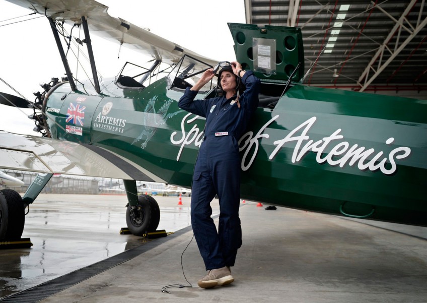 British aviator completes epic flight in vintage biplane