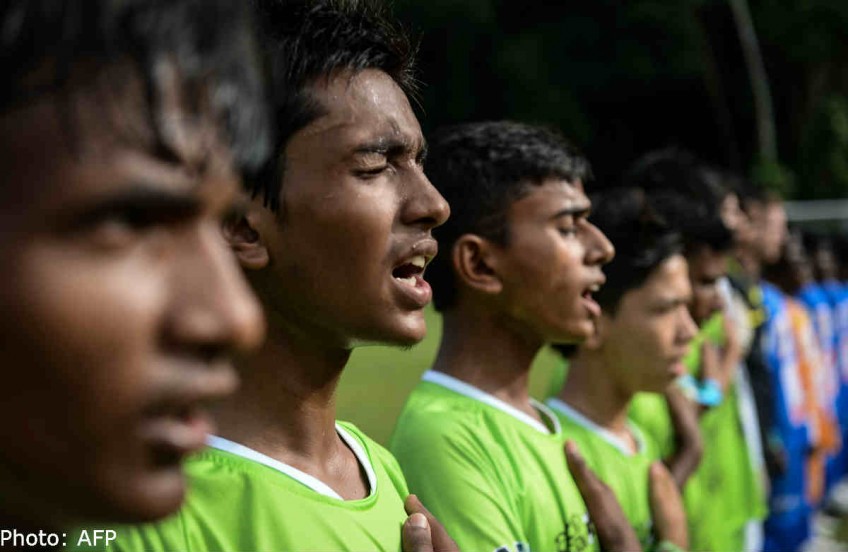 Football: Pakistan street children return to rapturous welcome