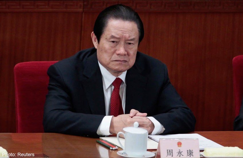 China's top 'tiger' caged by graft probe