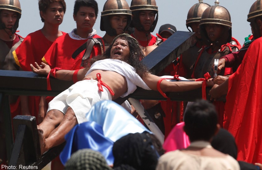Filipinos nailed to cross in Easter ritual frowned on by church