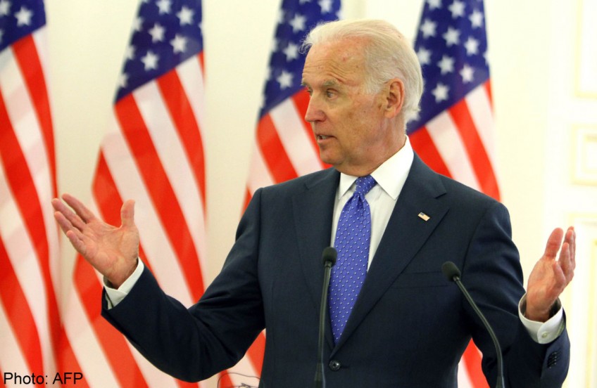 US Vice-president Joe Biden says Russia 'trying to pull Ukraine apart'