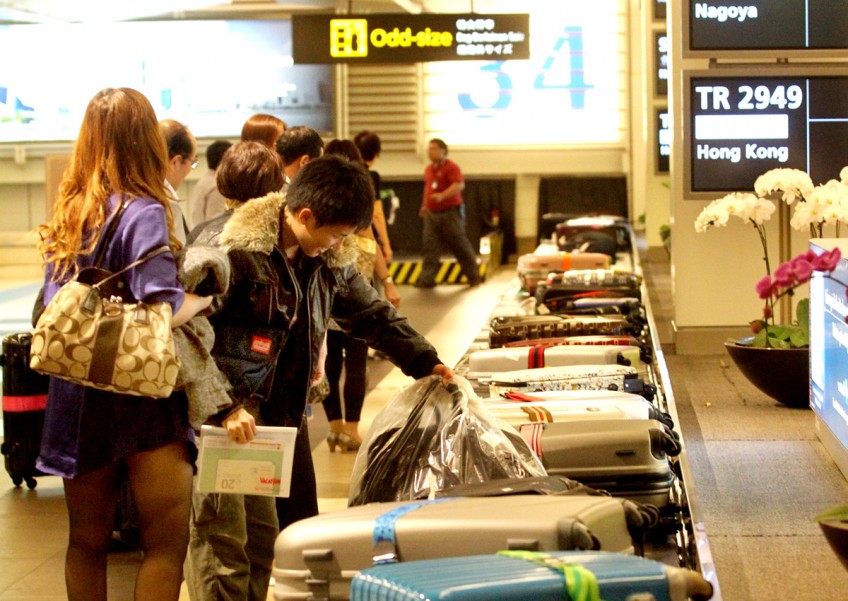 Wait for bags at Changi may take longer