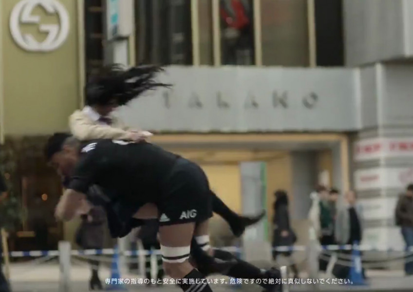 Too violent? All Blacks tackle random Tokyo pedestrians in hilarious ad
