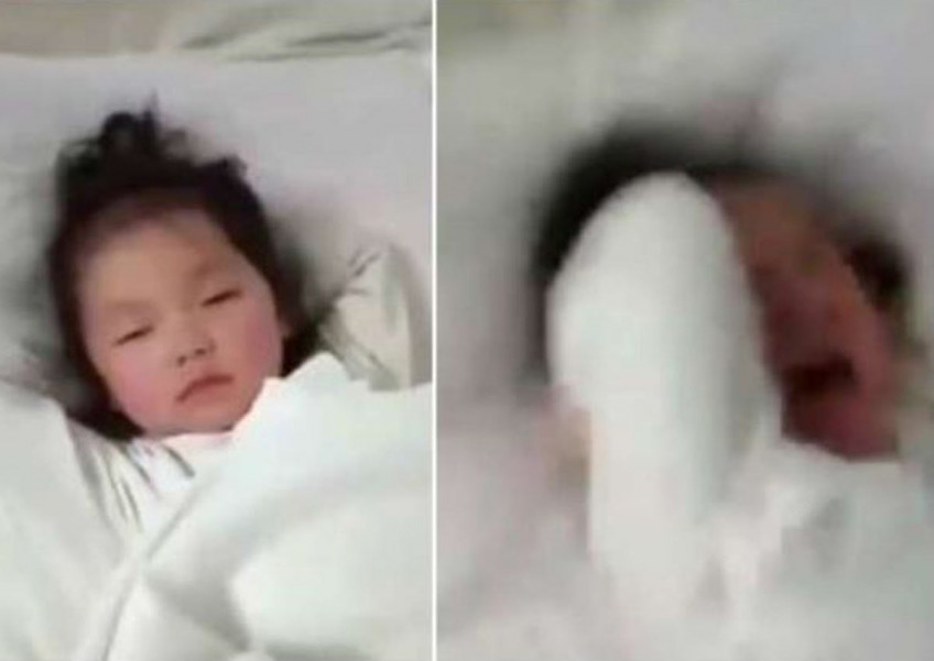 Chinese father films himself slapping 5-year-old daughter to get ex-wife's attention