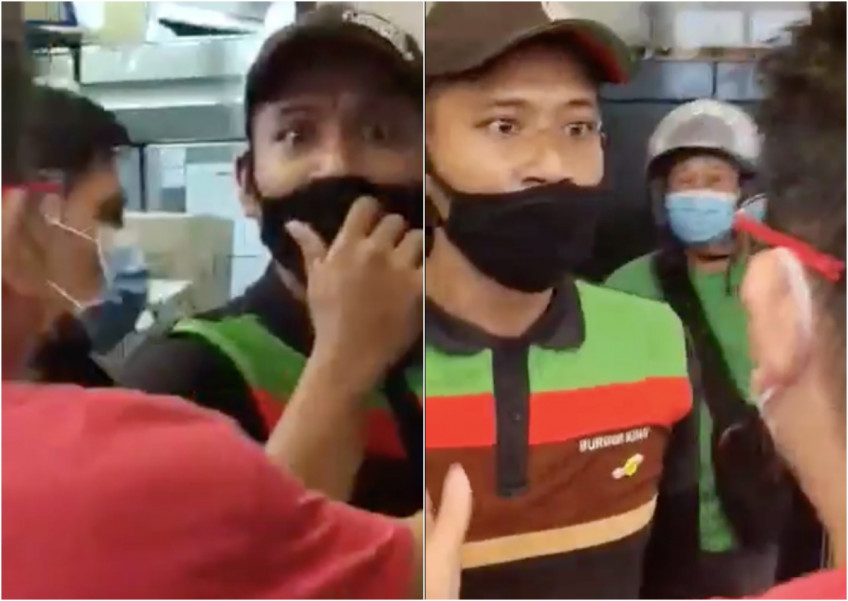 Under pressure: Argument breaks out between GrabFood rider and Burger King staff 