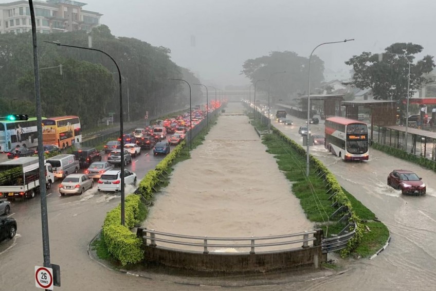 Flash floods across Singapore on Saturday after heavy rain
