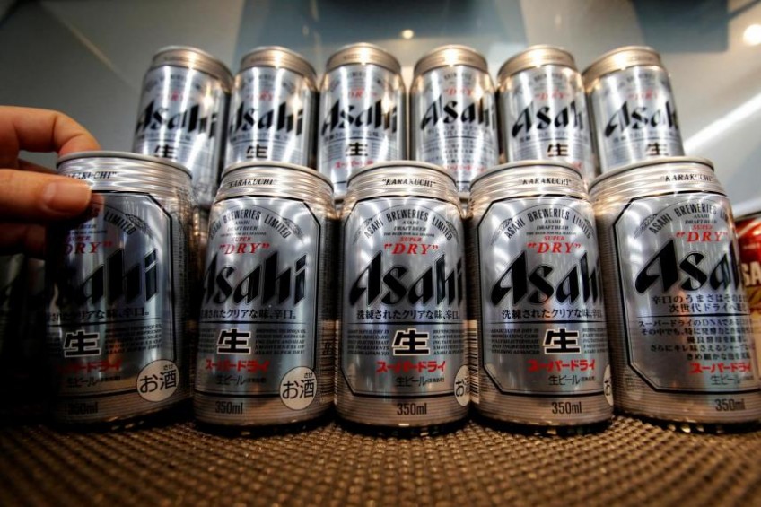 Japanese beer maker Asahi announces first price hikes in 14 years; shares jump