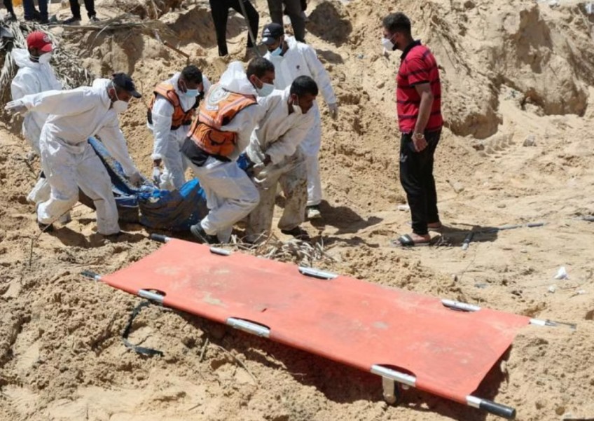 Palestinian authorities seek probe into mass graves at Gaza hospitals