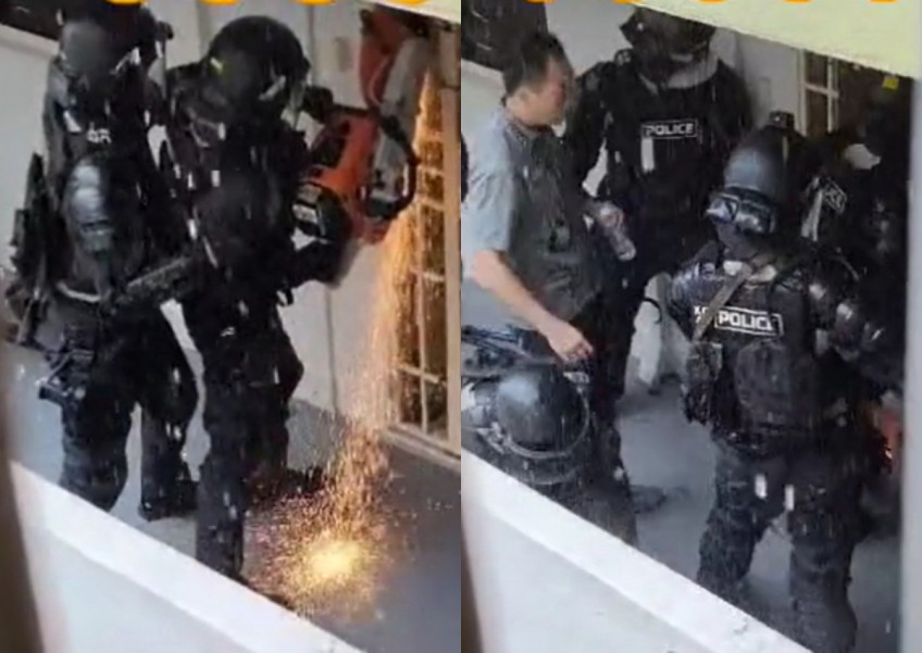Police armed with riot-control weapon and electric saw break into Lengkok Bahru HDB unit after man locks himself in