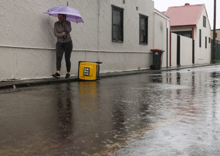 Flood-hit Sydney residents urged to higher ground after torrential rains