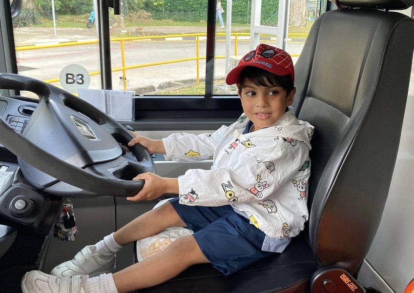 'He's got a big heart filled with love for buses!' SBS Transit lets 4-year-old sit on bus captain's seat to fulfil dream
