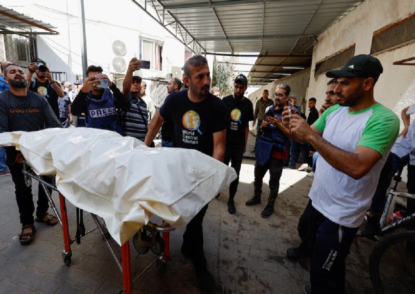 Bodies of foreign aid workers killed in Israeli strike leave Gaza