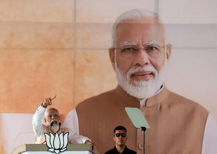Modi sets ambitious India economic goals for probable third term