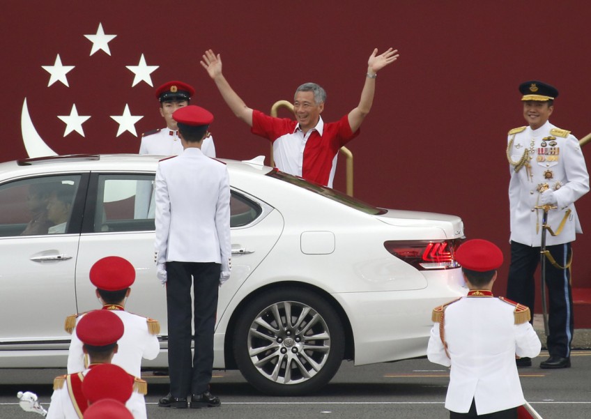 PM Lee says atmosphere at NDP was 'electric', shares his own photos of the Parade