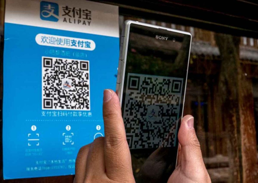 No loose change? Beggars in China now accepting mobile payments