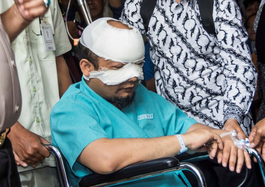 Indonesian graft buster probes acid attack on himself as police draw blank