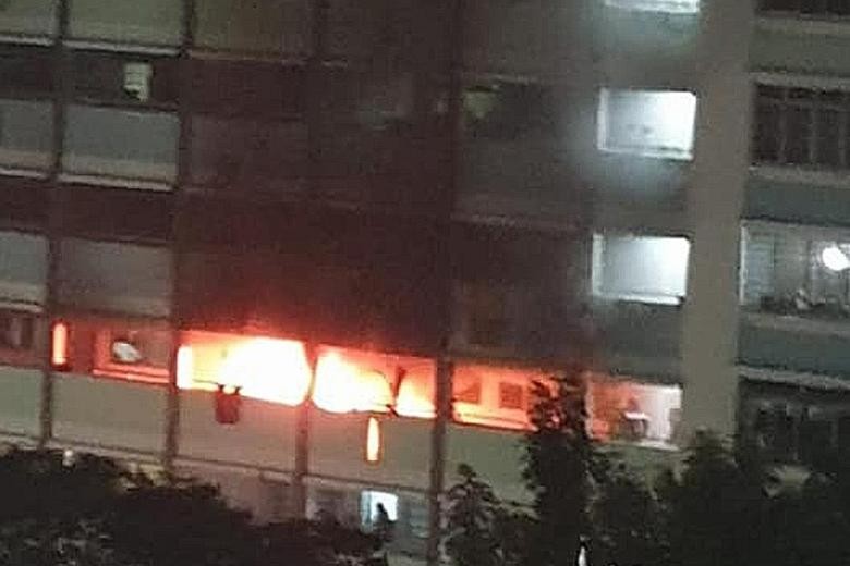 Woman stranded on kitchen ledge after fire broke out in Jurong West flat