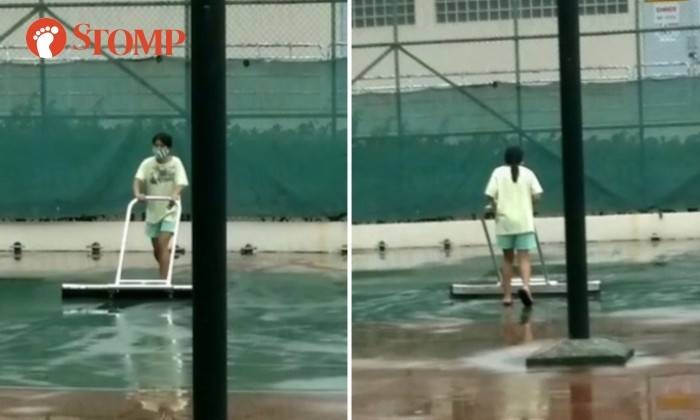 MOM responds after resident spots domestic helper drying, cleaning condo tennis court multiple times