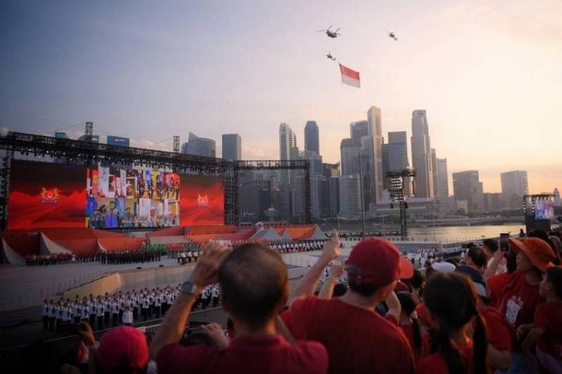 'It's good to see the parade back to normal': Over 25,000 people celebrate Singapore's first full parade since pandemic