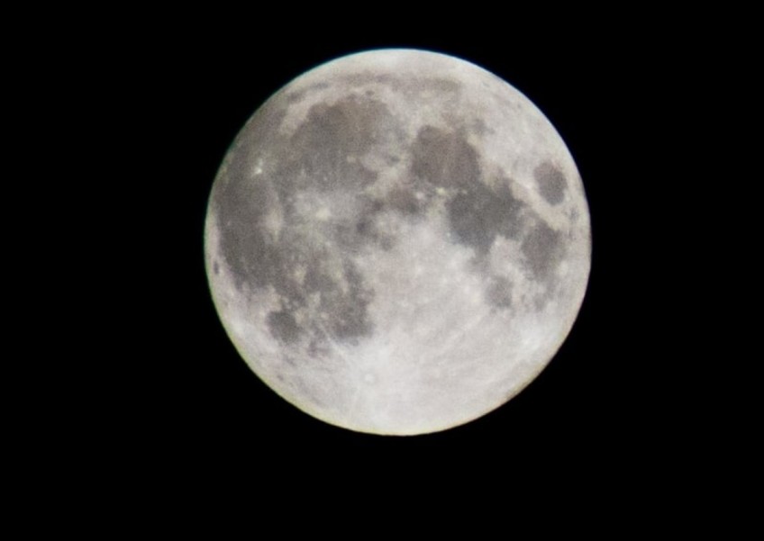 A super blue moon on the eve of the Singapore Presidential Election 2023