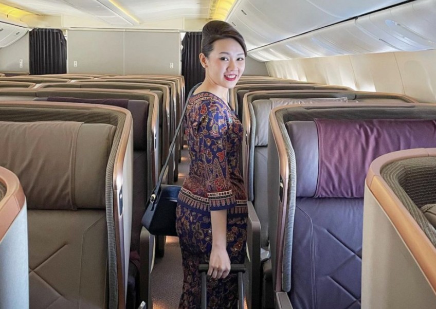 'No social life': This SIA stewardess juggled school and flying at the same time 
