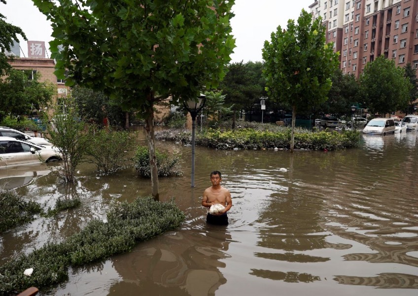China avoids climate change discussion despite extreme weather