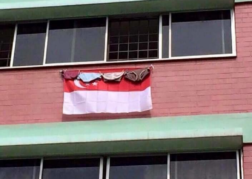 'Absolutely disrespectful': Resurfaced photo of underwear hanging over Singapore flag incurs public wrath