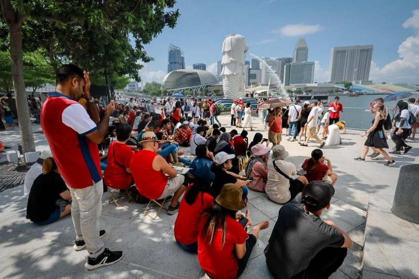 No ticket? No problem as crowds throng Marina Barrage, Merlion Park to catch NDP festivities