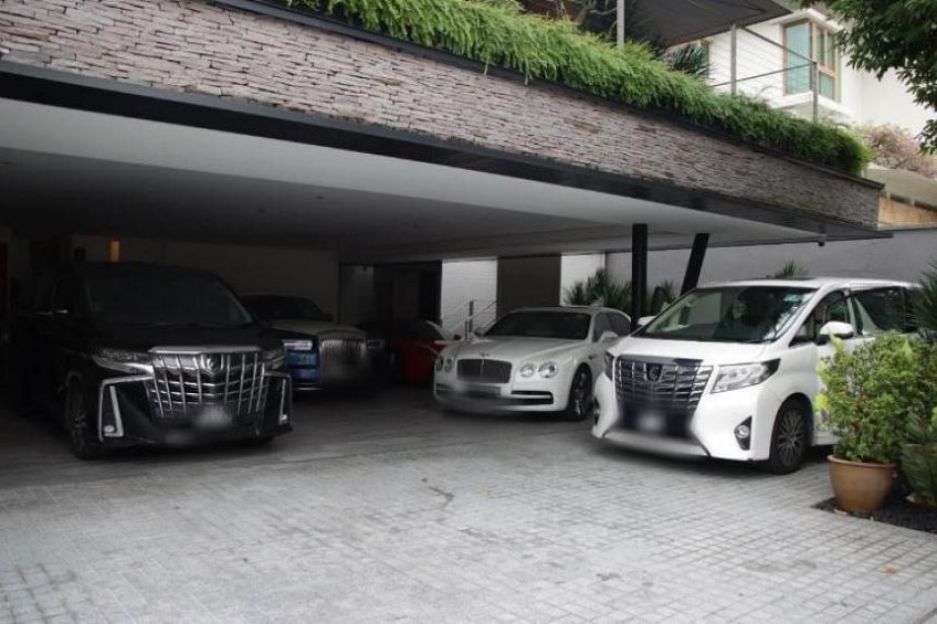 $1b worth of GCBs, cars and assets seized in one of Singapore's biggest anti-money laundering operations