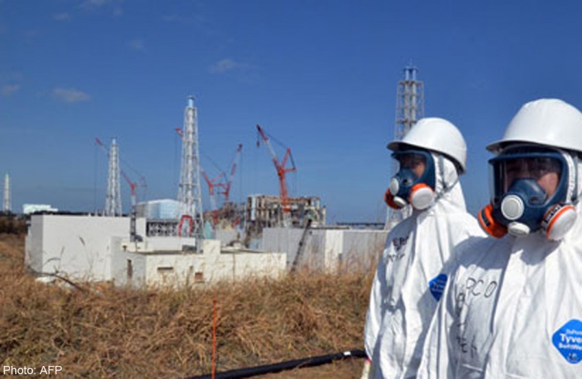 Japan city launches legal bid to halt reactor build 
