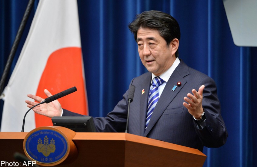 China condemns Japan PM for criticising air defence zone