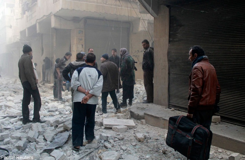 Aleppo bombing kills hundreds, threatening Syria talks