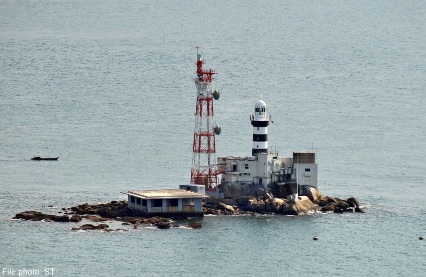Two vessels collide near Pedra Branca, resulting in some oil spillage
