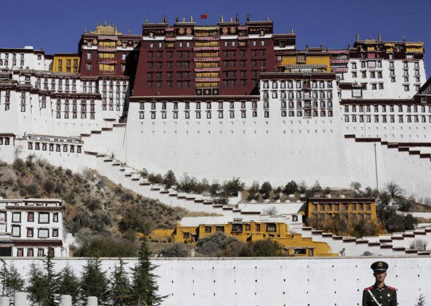 China deploys mass surveillance to secure streets around ancient Tibetan temple