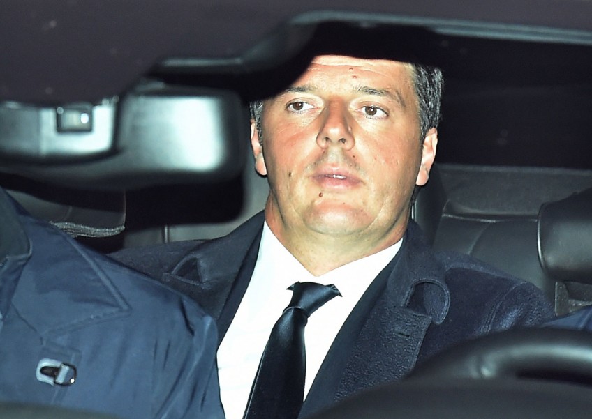 Italy's Renzi resigns, hints at early election