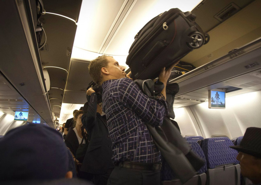 Flight attendants don't have to carry your bag and 10 things they wish you knew
