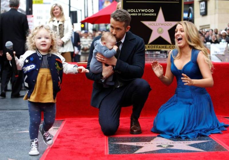 Ryan Reynolds finds it "harder and harder" to leave the house with three children at home