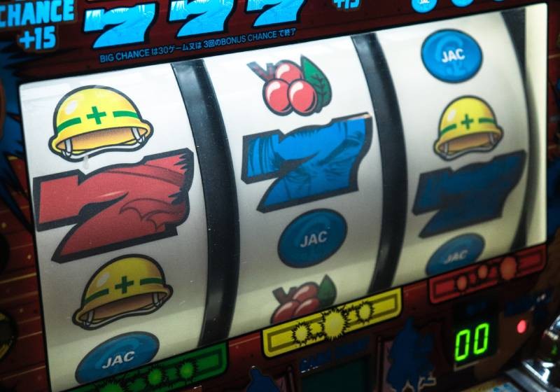 Japan probe into casino bribery case widens, pachinko operator raided