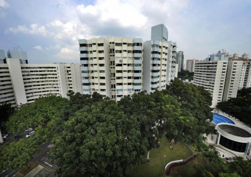What is share value, and how does it affect en bloc sales proceeds?