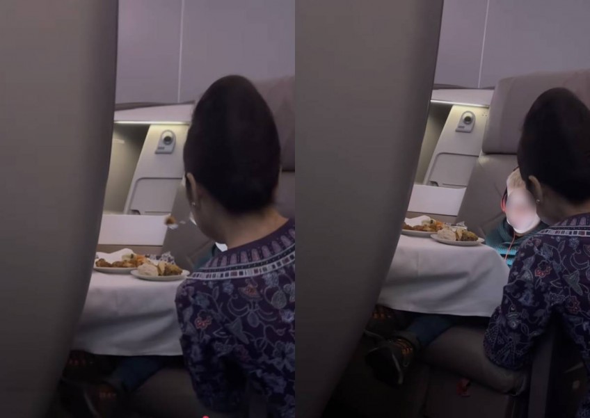 'Flight attendants are not babysitters': Video of SIA stewardess feeding boy in business class sparks debate