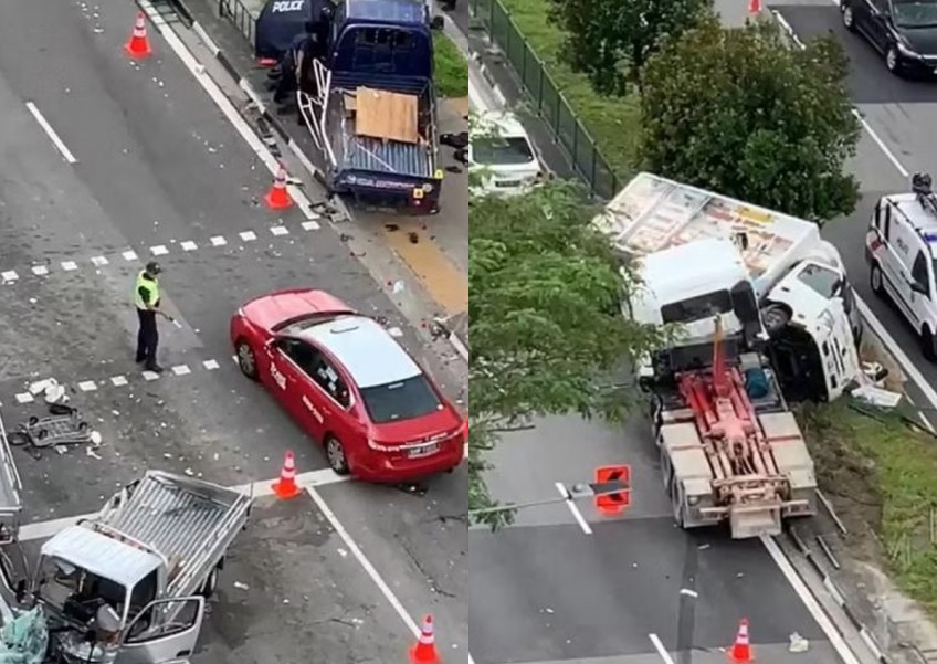Motorcyclist dies after being pinned under lorry in 7-vehicle accident at Woodlands