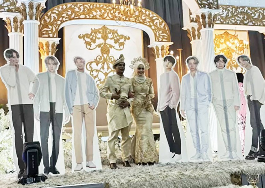 8 'husbands'? Malaysian bride brings life-sized BTS standees to own wedding, one nearly breaks