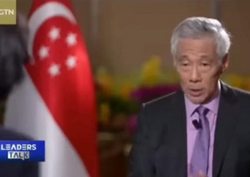 'Very convincing but completely bogus': PM Lee warns of deepfake video of him promoting investment scams