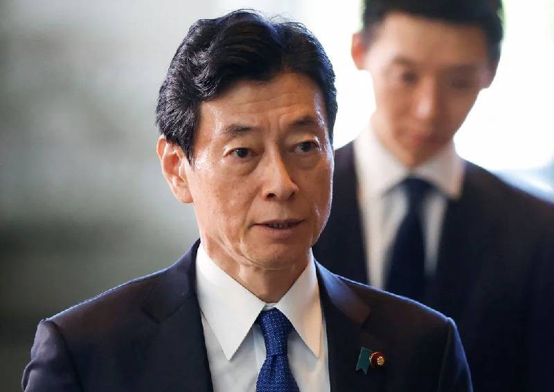 Japan industry minister reviewing finances amid funds scandal