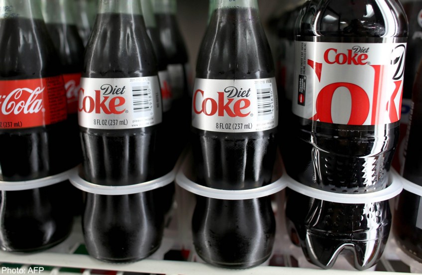 Coca-Cola profit falls 8%