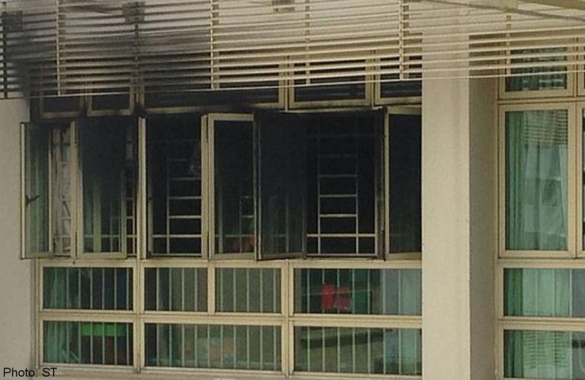 Elderly woman and 4-year-old rescued from fire at Punggol flat