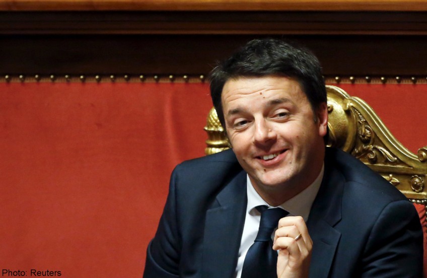 New Italy PM wins confidence vote, vows 'radical change'