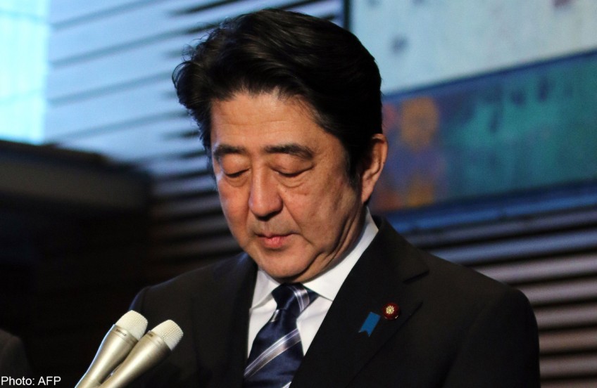Japan PM ex-adviser praises apartheid in embarrassment for Abe