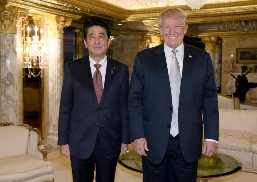 Fairway diplomacy: Abe putting hope in golf with Trump